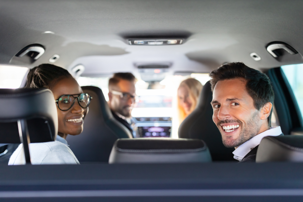 group of people in a car