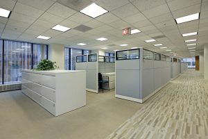 office area with gray cubicles